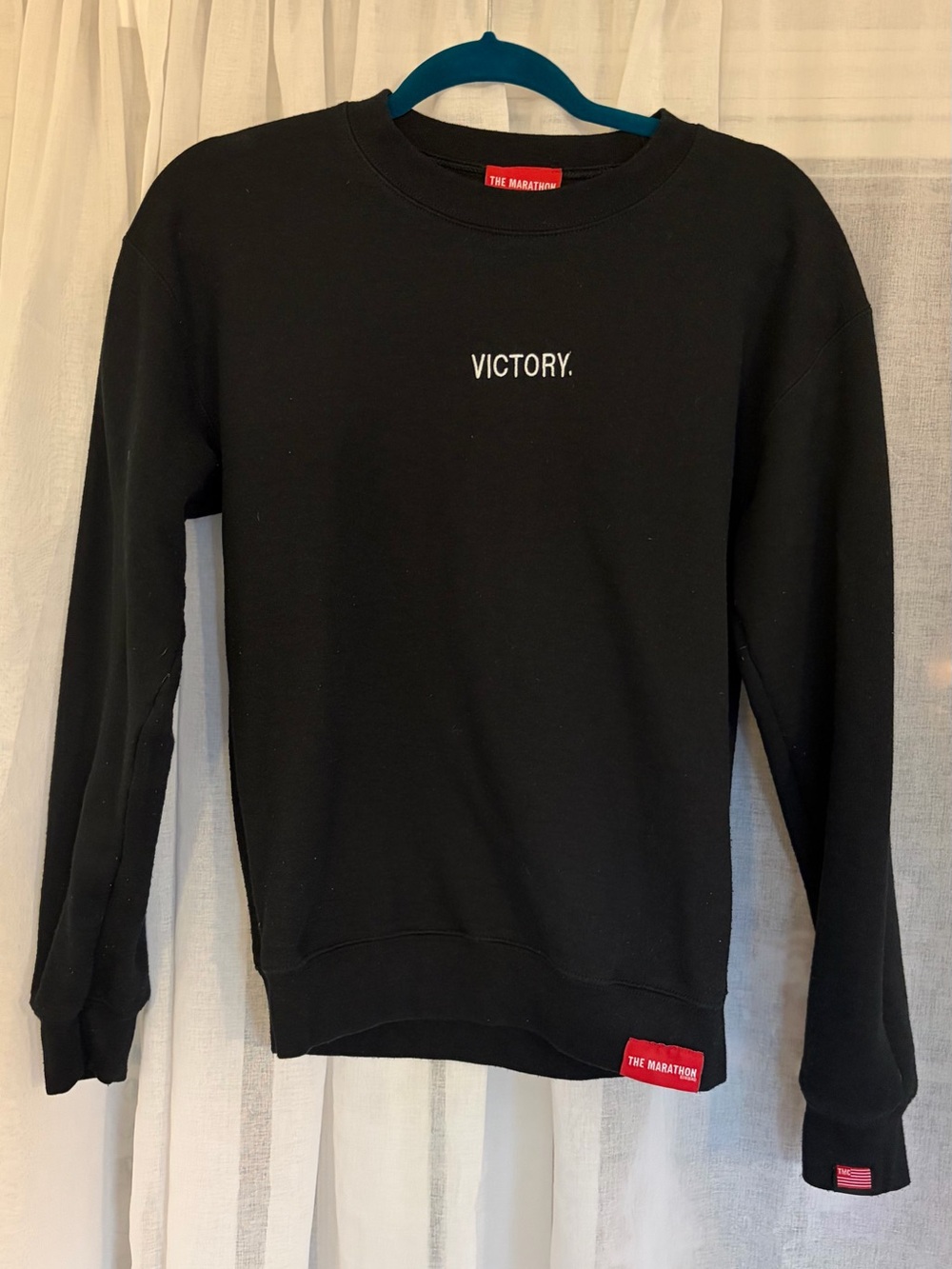 The Marathon Clothing Black Crewneck Sweatshirt with White 'VICTORY.' Text